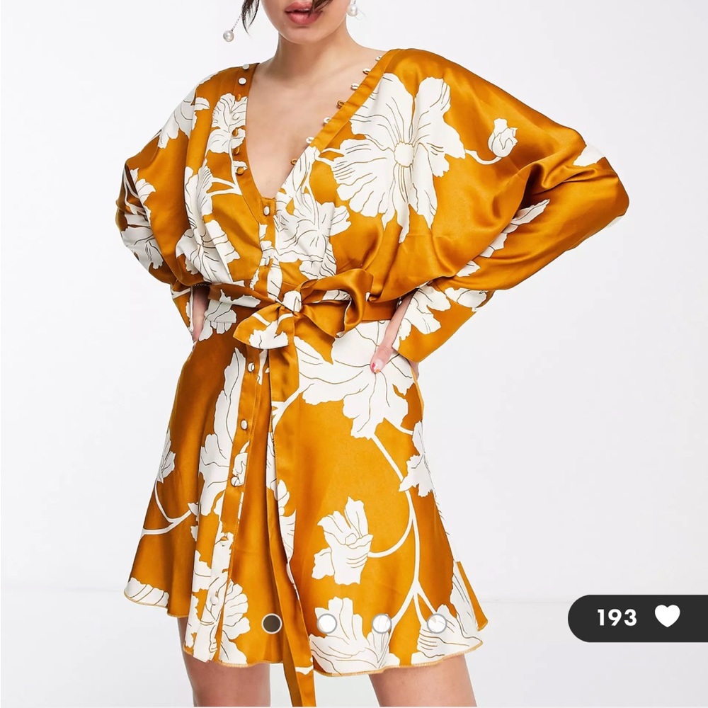 Asos batwing long sleeve satin dress with open back detail.